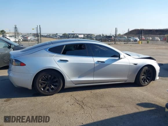 ✅ 2016 Tesla Model S 90D • VIN: 5YJSA1E25GF151367 • Lot: 43086781. Listed on IAAI with 149,959 mi. Free auction sales archive from the USA and detailed vehicle history report at DreamBid. Image 12.