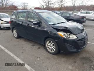 ✅ 2013 Mazda 5 Sport • VIN: JM1CW2BL9D0145428 • Lot: 43698738. Listed on IAAI with 191,620 mi. Free auction sales archive from the USA and detailed vehicle history report at DreamBid. Image 1.