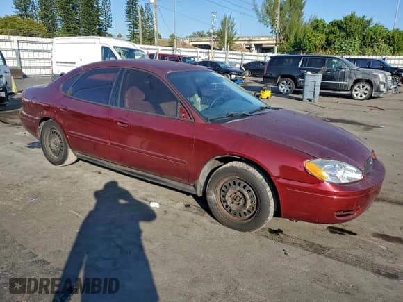 ✅ 2005 Ford Taurus SE • VIN: 1FAFP53UX5A252153 • Lot: 94035295. Listed on Copart with 83,532 mi. Free auction sales archive from the USA and detailed vehicle history report at DreamBid. Image 4.