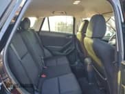 ✅ 2015 Mazda CX-5 Sport • VIN: JM3KE2BE8F0490900 • Лот: 94381785. Опубликован ранее на Copart с пробегом 54 563 миль. Бесплатный доступ к архиву аукционных продаж из США и подробный отчёт об истории автомобиля на DreamBid. Изображение 11.