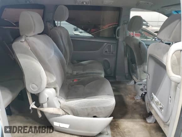 2005 Toyota Sienna LE z VIN 5TDZA23C45S222311, wystawiony jako Copart lot #91394525 z przebiegiem 296 789 mil mil oraz Czysty tytuł • Clean title. Historia ofert i sprzedaży dostępna na DreamBid. Obrazek 11.