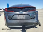 ✅ 2021 Toyota Prius Limited • VIN: JTDKAMFP1M3178229 • Lot: 82613165. Listed on Copart with 358,191 mi. Free auction sales archive from the USA and detailed vehicle history report at DreamBid. Image 6.