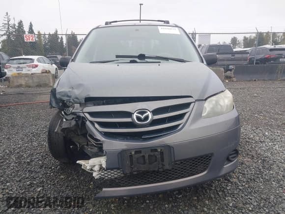 ✅ 2006 Mazda MPV LX • VIN: JM3LW28J960567666 • Lot: 43556672. Listed on IAAI with 204,031 mi. Free auction sales archive from the USA and detailed vehicle history report at DreamBid. Image 12.