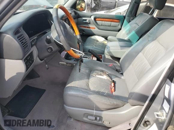 ✅ 2002 Lexus LX 470 • VIN: JTJHT00W323518536 • Lot: 89925195. Wystawiony na Copart z przebiegiem 201 447 mil. Bezpłatny archiwum sprzedaży aukcyjnych z USA i szczegółowy raport historii pojazdu na DreamBid. Zdjęcie 7.