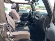 ✅ 2014 Jeep Wrangler Sahara • VIN: 1C4GJWBG0EL240812 • Lot: 42812932. Listed on IAAI with 130,313 mi. Free auction sales archive from the USA and detailed vehicle history report at DreamBid. Image 5.