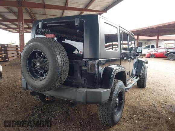 ✅ 2008 Jeep Wrangler Unlimited Sahara • VIN: 1J8GA59128L542384 • Lot: 42184176. Listed on IAAI with 152,768 mi. Free auction sales archive from the USA and detailed vehicle history report at DreamBid. Image 4.