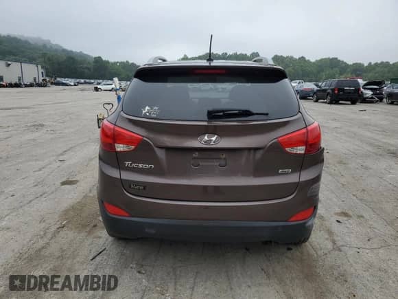 2014 Hyundai Tucson Limited z VIN KM8JUCAG3EU848083, wystawiony jako Copart lot #63944605 z przebiegiem 137 773 mil mil oraz Szkoda całkowita • Salvage title. Historia ofert i sprzedaży dostępna na DreamBid. Obrazek 6.
