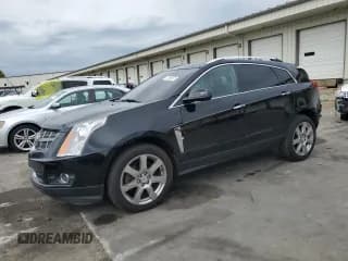✅ 2011 Cadillac SRX Performance Collection • VIN: 3GYFNBEY6BS594637 • Лот: 71680575. Опубликован ранее на Copart с пробегом 156 229 миль. Бесплатный доступ к архиву аукционных продаж из США и подробный отчёт об истории автомобиля на DreamBid. Изображение 1.