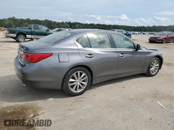 ✅ 2014 Infiniti Q50 • VIN: JN1BV7AR8EM702523 • Лот: 70884865. Опубликован ранее на Copart с пробегом 266 091 миль. Бесплатный доступ к архиву аукционных продаж из США и подробный отчёт об истории автомобиля на DreamBid. Изображение 3.