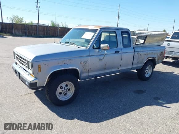 ✅ 1987 Ford Ranger • VIN: 1FTCR15T5HPB40124 • Lot: 42177557. Listed on IAAI with 7,957 mi. Free auction sales archive from the USA and detailed vehicle history report at DreamBid. Image 2.