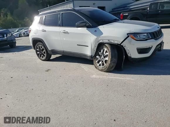 ✅ 2021 Jeep Compass Trailhawk • VIN: 3C4NJDDBXMT590531 • Lot: 86219185. Listed on Copart with 58,645 mi. Free auction sales archive from the USA and detailed vehicle history report at DreamBid. Image 14.