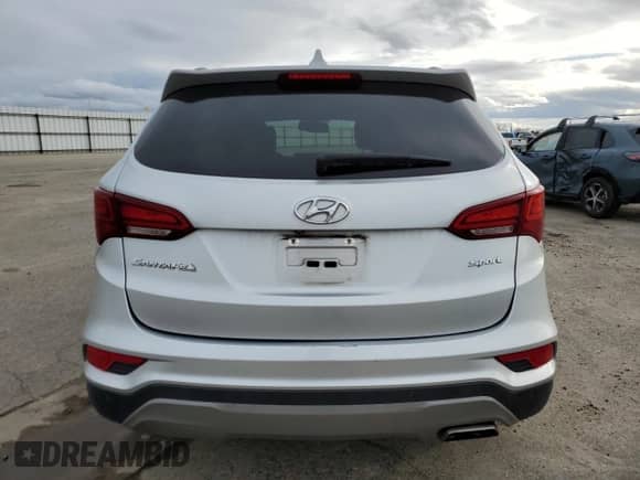 ✅ 2018 Hyundai Santa Fe 2.4L • VIN: 5XYZU3LB6JG505739 • Lot: 36757263. Wystawiony na Copart z przebiegiem 66 423 mil mil. Skorzystaj z bezpłatnego archiwum sprzedaży aukcyjnych z USA i zobacz szczegółowy raport historii pojazdu na DreamBid. Zdjęcie 6.