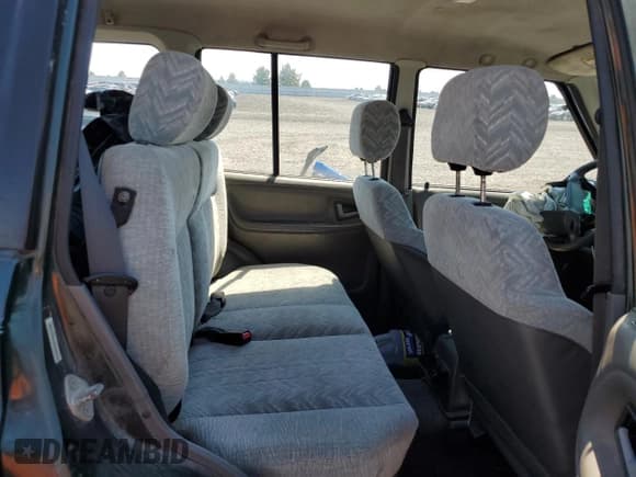 ✅ 1998 Suzuki Sidekick • VIN: JS3TD21V9W4103914 • Lot: 62112514. Listed on Copart with 394,872 mi. Free auction sales archive from the USA and detailed vehicle history report at DreamBid. Image 11.