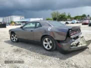 ✅ 2022 Dodge Challenger SXT • VIN: 2C3CDZAG7NH151877 • Lot: 69487744. Wystawiony na Copart z przebiegiem 45 583 mil. Bezpłatny archiwum sprzedaży aukcyjnych z USA i szczegółowy raport historii pojazdu na DreamBid. Zdjęcie 2.