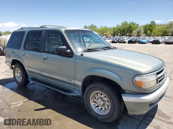 ✅ 1997 Ford Explorer XLT • VIN: 1FMDU32P5VZB36074 • Lot: 57289935. Listed on Copart with 185,654 mi. Free auction sales archive from the USA and detailed vehicle history report at DreamBid. Image 4.