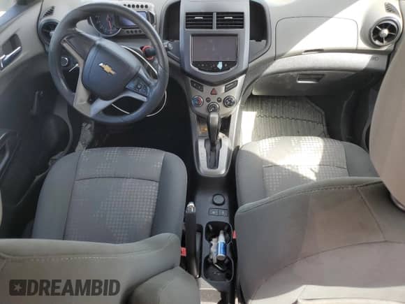 2013 Chevrolet Sonic LS с VIN 1G1JA5SH4D4173075, выставлен на аукционе Copart как лот 73911424 с пробегом Не указан миль и Списание • Salvage title. История ставок и продаж доступна на DreamBid. Изображение 8.