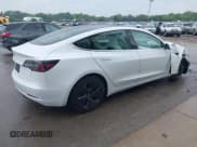 ✅ 2020 Tesla Model 3 Standard Range Plus • VIN: 5YJ3E1EA7LF599054 • Lot: 42359723. Wystawiony na IAAI z przebiegiem 104 088 mil. Bezpłatny archiwum sprzedaży aukcyjnych z USA i szczegółowy raport historii pojazdu na DreamBid. Zdjęcie 4.