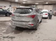 ✅ 2017 Hyundai Santa Fe 2.4L • VIN: 5NMZTDLB9HH000738 • Lot: 43829716. Listed on IAAI with 154,400 mi. Free auction sales archive from the USA and detailed vehicle history report at DreamBid. Image 4.