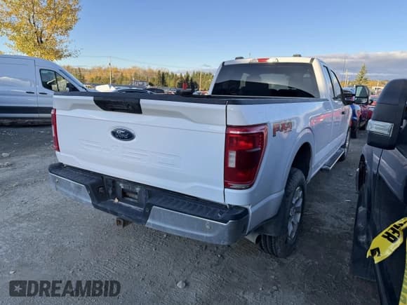 ✅ 2021 Ford F-150 XL • VIN: 1FTFX1E52MKE60433 • Lot: 86135935. Listed on Copart with 102,213 mi. Free auction sales archive from the USA and detailed vehicle history report at DreamBid. Image 3.