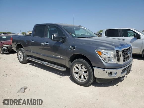 ✅ 2017 Nissan Titan SV • VIN: 1N6AA1F25HN556025 • Лот: 50098995. Опубликован ранее на Copart с пробегом 161 927 миль. Бесплатный доступ к архиву аукционных продаж из США и подробный отчёт об истории автомобиля на DreamBid. Изображение 4.