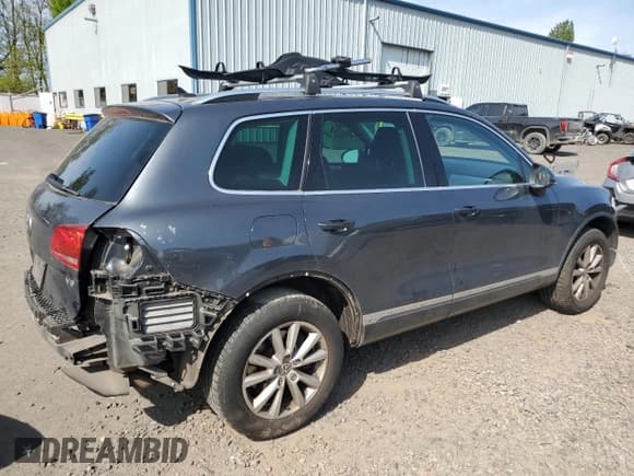 ✅ 2013 Volkswagen Touareg Exec • VIN: WVGEF9BP2DD000126 • Lot: 54430375. Listed on Copart with 111,677 mi. Free auction sales archive from the USA and detailed vehicle history report at DreamBid. Image 3.