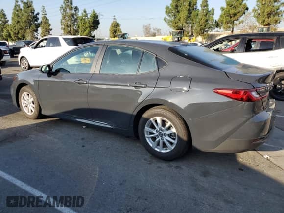 2025 Toyota Camry LE with VIN 4T1DAACK8SU067003, listed as a Copart auction lot 84061975 with 9,394 mi miles and Salvage title. Bid and sale history available at DreamBid. Image 2.