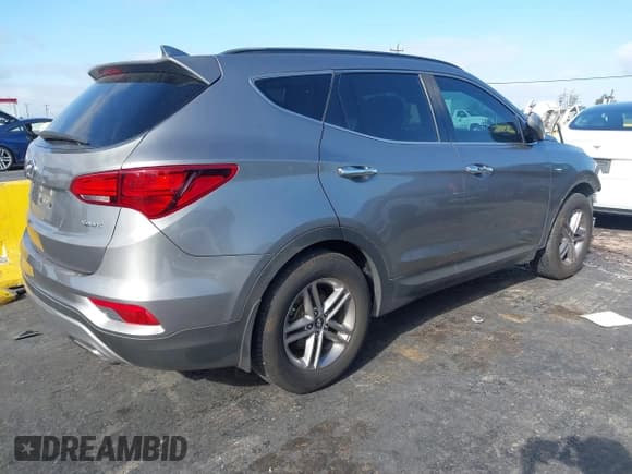 ✅ 2017 Hyundai Santa Fe 2.4L • VIN: 5NMZU3LB1HH012955 • Lot: 43634021. Listed on IAAI with 75,051 mi. Free auction sales archive from the USA and detailed vehicle history report at DreamBid. Image 4.