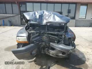 2003 Dodge Dakota Sport z VIN 1D7HG38N93S323350, wystawiony jako Copart lot #68911784 z przebiegiem 137 395 mil mil oraz Czysty tytuł • Clean title. Historia ofert i sprzedaży dostępna na DreamBid. Obrazek 5.