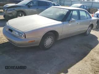 ✅ 1997 Oldsmobile 88 LS • VIN: 1G3HN52K8V4855884 • Лот: 57207865. Опубликован ранее на Copart с пробегом 159 939 миль. Бесплатный доступ к архиву аукционных продаж из США и подробный отчёт об истории автомобиля на DreamBid. Изображение 1.