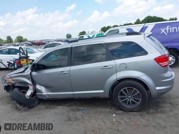 2018 Dodge Journey SE с VIN 3C4PDCAB9JT444843, выставлен на аукционе IAAI как лот 42473807 с пробегом 146 996 миль миль и . История ставок и продаж доступна на DreamBid. Изображение 15.