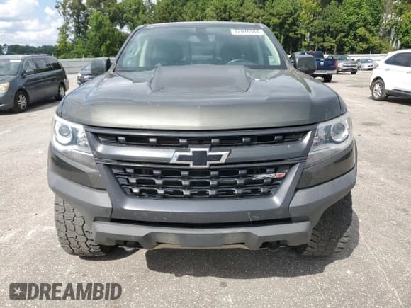 ✅ 2017 Chevrolet Colorado 4WD ZR2 • VIN: 1GCGTEEN0H1311246 • Лот: 72078584. Опубликован ранее на Copart с пробегом 119 678 миль. Бесплатный доступ к архиву аукционных продаж из США и подробный отчёт об истории автомобиля на DreamBid. Изображение 5.
