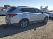 ✅ 2018 Hyundai Santa Fe SE Ultimate • VIN: KM8SR4HFXJU279199 • Лот: 91659675. Опубликован ранее на Copart с пробегом 147 285 миль. Бесплатный доступ к архиву аукционных продаж из США и подробный отчёт об истории автомобиля на DreamBid. Изображение 3.