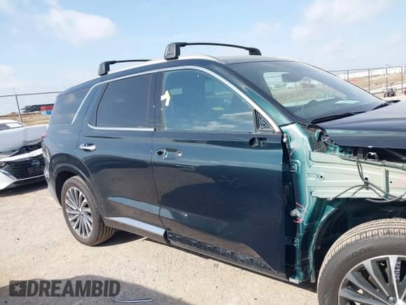 2025 Hyundai Palisade Calligraphy with VIN KM8R74GE6SU856907, listed as a IAAI auction lot 42065127 with 5,184 mi miles and . Bid and sale history available at DreamBid. Image 13.