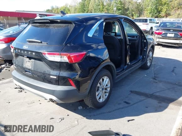 ✅ 2020 Ford Escape SE • VIN: 1FMCU0G63LUA92029 • Lot: 43353021. Listed on IAAI with 140,035 mi. Free auction sales archive from the USA and detailed vehicle history report at DreamBid. Image 4.