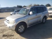 ✅ 2003 Mitsubishi Montero Limited • VIN: JA4NW51S13J030523 • Lot: 75870834. Listed on Copart with 123,320 mi. Free auction sales archive from the USA and detailed vehicle history report at DreamBid. Image 1.