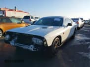 ✅ 2013 Dodge Challenger SXT • VIN: 2C3CDYAG8DH582012 • Lot: 43634202. Listed on IAAI with 141,359 mi. Free auction sales archive from the USA and detailed vehicle history report at DreamBid. Image 17.