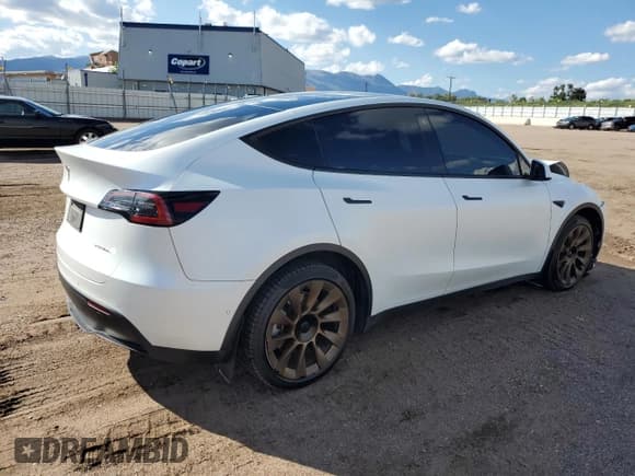 ✅ 2022 Tesla Model Y Long Range • VIN: 7SAYGDEE4NF354657 • Lot: 81276555. Listed on Copart with 103,716 mi. Free auction sales archive from the USA and detailed vehicle history report at DreamBid. Image 3.