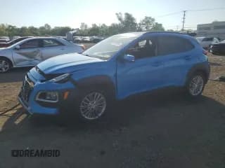 ✅ 2019 Hyundai Kona SEL • VIN: KM8K62AAXKU256910 • Лот: 81562095. Опубликован ранее на Copart с пробегом 24 332 миль. Бесплатный доступ к архиву аукционных продаж из США и подробный отчёт об истории автомобиля на DreamBid. Изображение 1.