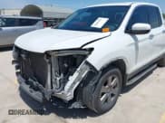 ✅ 2020 Honda Ridgeline RTL-E • VIN: 5FPYK3F77LB012677 • Lot: 42685209. Wystawiony na IAAI z przebiegiem 132 894 mil. Bezpłatny archiwum sprzedaży aukcyjnych z USA i szczegółowy raport historii pojazdu na DreamBid. Zdjęcie 6.