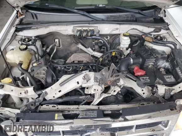 ✅ 2008 Ford Escape XLS • VIN: 1FMCU02Z18KC18571 • Lot: 93181235. Listed on Copart with 147,586 mi. Free auction sales archive from the USA and detailed vehicle history report at DreamBid. Image 12.