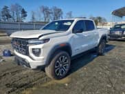 ✅ 2024 GMC Canyon 4WD AT4 • VIN: 1GTP6DEK0R1308050 • Лот: 95549815. Опубликован ранее на Copart с пробегом 6 937 миль. Бесплатный доступ к архиву аукционных продаж из США и подробный отчёт об истории автомобиля на DreamBid. Изображение 1.