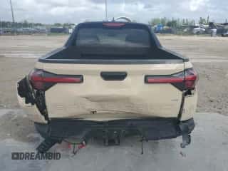 2022 Hyundai Santa Cruz SEL с VIN 5NTJBDAE6NH001794, выставлен на аукционе Copart как лот 79401464 с пробегом 59 515 миль миль и На запчасти • Non repairable. История ставок и продаж доступна на DreamBid. Изображение 6.