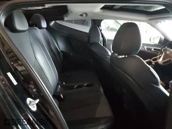 2012 Hyundai Veloster w/Red Int z VIN KMHTC6AD1CU054411, wystawiony jako Copart lot #73357964 z przebiegiem 12 486 mil mil oraz Szkoda całkowita • Salvage title. Historia ofert i sprzedaży dostępna na DreamBid. Obrazek 10.