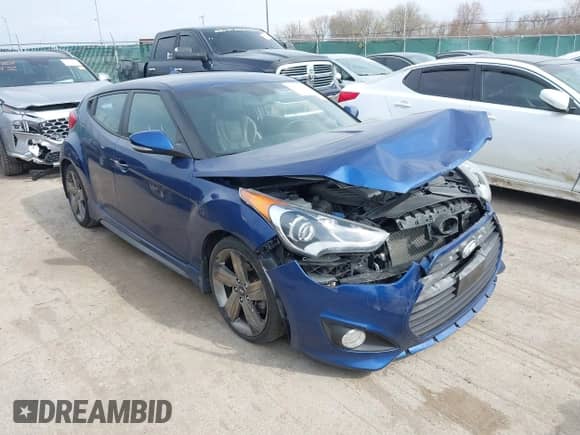 2015 Hyundai Veloster Turbo R-Spec z VIN KMHTC6AE1FU241628, wystawiony jako IAAI lot #42013008 z przebiegiem 110 357 mil mil oraz . Historia ofert i sprzedaży dostępna na DreamBid. Obrazek 1.