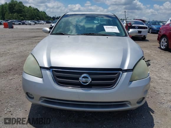 ✅ 2003 Nissan Altima SE • VIN: 1N4BL11D03C121112 • Лот: 42658692. Опубликован ранее на IAAI с пробегом 175 741 миль. Бесплатный доступ к архиву аукционных продаж из США и подробный отчёт об истории автомобиля на DreamBid. Изображение 12.