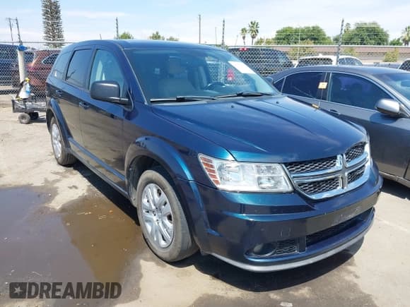✅ 2014 Dodge Journey American Value • VIN: 3C4PDCAB1ET287590 • Lot: 43072351. Listed on IAAI with 149,217 mi. Free auction sales archive from the USA and detailed vehicle history report at DreamBid. Image 1.