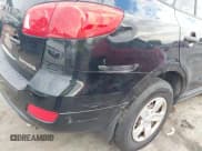 ✅ 2009 Hyundai Santa Fe GLS • VIN: 5NMSG13D29H322340 • Lot: 43335825. Listed on IAAI with 306,617 mi. Free auction sales archive from the USA and detailed vehicle history report at DreamBid. Image 6.