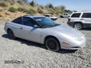 ✅ 2001 Saturn SC • VIN: 1G8ZP12891Z219977 • Лот: 60248255. Опубликован ранее на Copart с пробегом 230 514 миль. Бесплатный доступ к архиву аукционных продаж из США и подробный отчёт об истории автомобиля на DreamBid. Изображение 4.