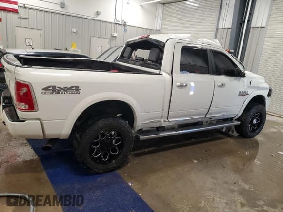✅ 2018 Ram 2500 Limited • VIN: 3C6UR5GL8JG114689 • Lot: 49301125. Listed on Copart with 168,642 mi. Free auction sales archive from the USA and detailed vehicle history report at DreamBid. Image 3.