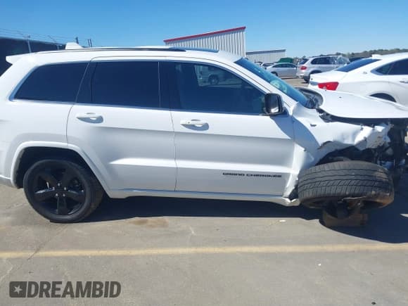 ✅ 2015 Jeep Grand Cherokee Altitude • VIN: 1C4RJEAG4FC815743 • Lot: 41815095. Wystawiony na IAAI z przebiegiem 106 867 mil. Bezpłatny archiwum sprzedaży aukcyjnych z USA i szczegółowy raport historii pojazdu na DreamBid. Zdjęcie 14.